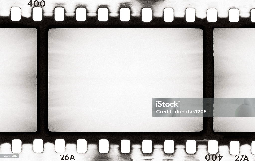 BW film strip - Zbiór zdjęć royalty-free (Bardzo ziarnisty)