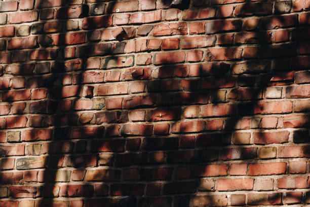 istock Brick brown with shadow textured detail background art 967827844