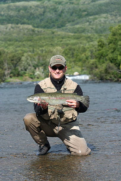 istock Trout fly fisherman 96783899