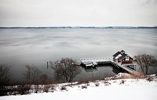 Winter landscape of Seneca lake with boathouse  lake seneca stock pictures, royalty-free photos & images