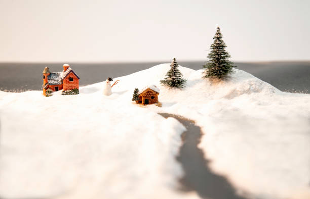 istock White snow on house and Christmas tree and snow man 967863204