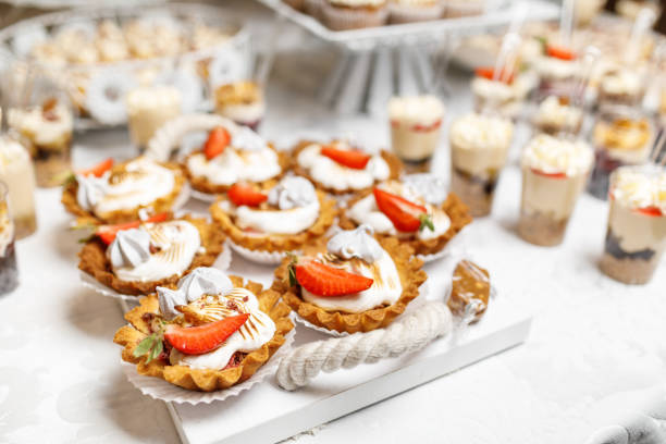 istock Dessert. Delicious cupcake on the table 967887074