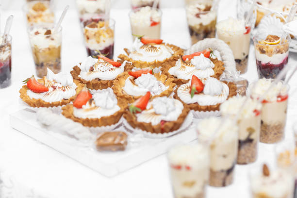 istock Dessert. Delicious cupcake on the table 967889340