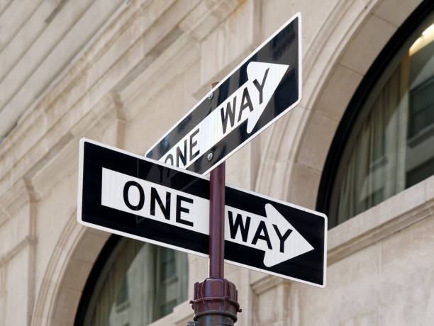 istock Double One Way Direction Sign Road Crossroad 967902956