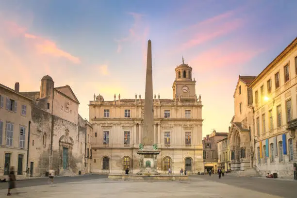 Arles, France - September 4, 2017: Arles at dusk, view of the Obelisk at the so called Place de Republique