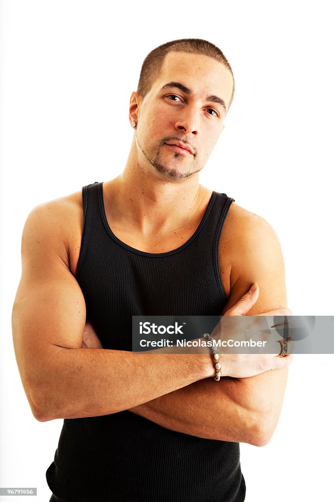 Joven caucásico, de sexo masculino con brazos cruzados - Foto de stock de 20 a 29 años libre de derechos