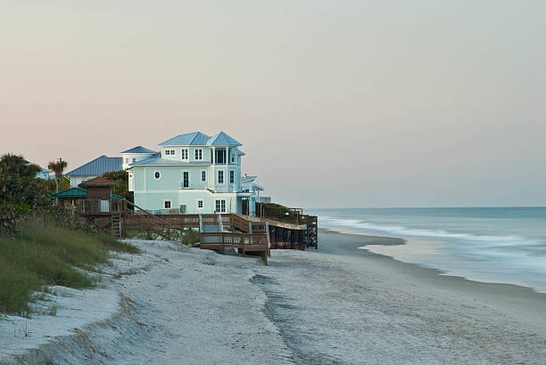istock Beach Mansion with Ocean Wave approaching on the Right 96791459