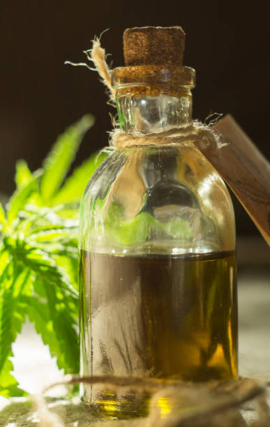 istock Hemp oil and cannabis leaves 967917386