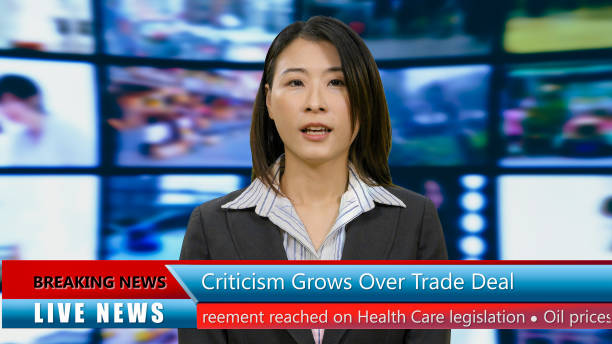istock Asian American anchorwoman with lower thirds 967921206