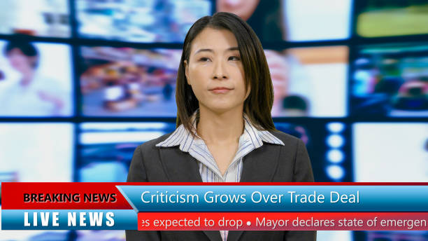 istock Asian American anchorwoman with lower thirds 967921234