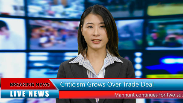 istock Asian American anchorwoman with lower thirds 967921280