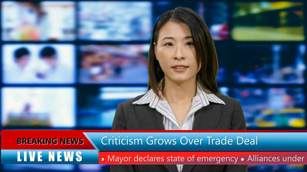 istock Asian American anchorwoman with lower thirds 967921336