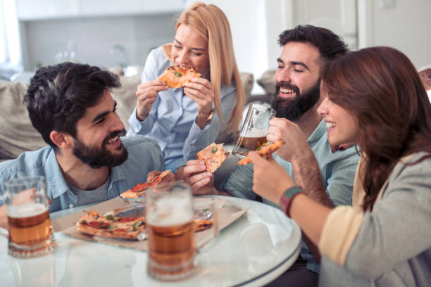 istock Friends having fun at home 967922408
