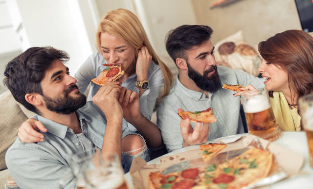 istock Friends having fun at home 967922484