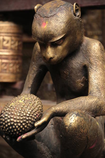 Statue Of A Monkey Holding A Jackfruit