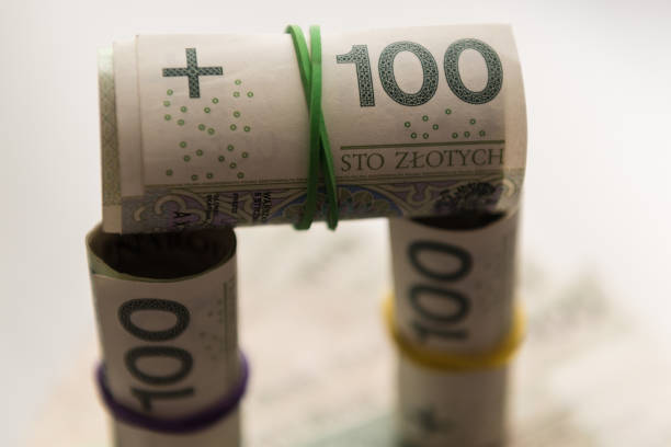 istock Rolls and stack of Polish Zloty banknotes 967933900