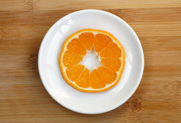 Cross cut of tangerine stock photo