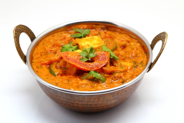 istock Indian Food or Indian Curry in a copper brass serving bowl. 967950610