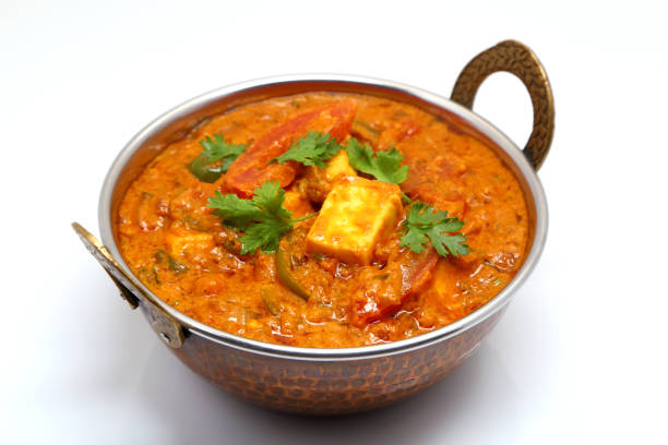 istock Indian Food or Indian Curry in a copper brass serving bowl. 967950714