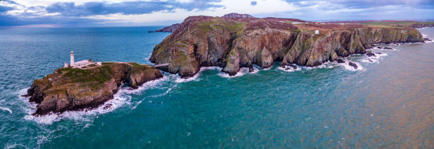 istock Aerial view of South Stack with lighthouse during sunset 967956652