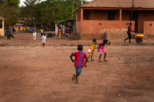Bissau, Republic of Guinea-Bissau - January 31, 2018: Group of children playing at the Cupelon de Baixo neighborhood in the city of Bissau, Guinea Bissau.