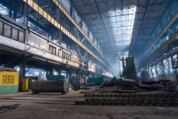 istock Factory workshop interior and machines. Abstract industrial background. 967961942