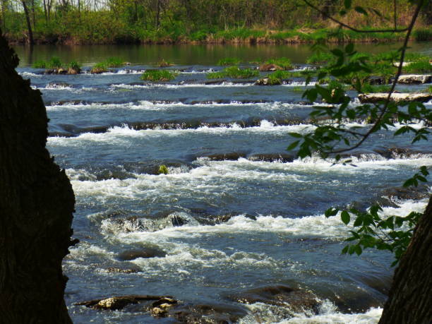 istock Beautiful flowing river water over rocks 967974618