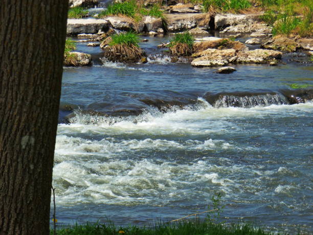 istock Beautiful flowing river water over rocks 967974692