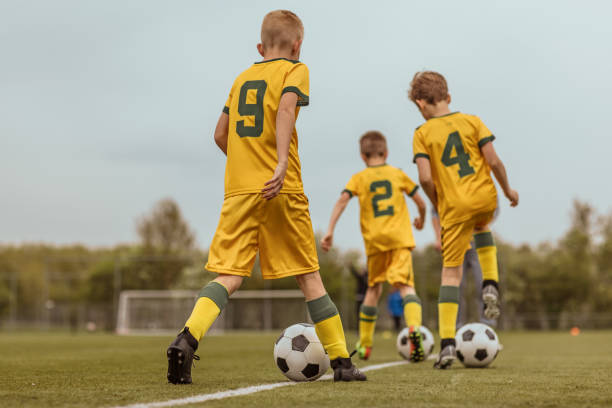 istock A boys soccer team during an intense football training session 967985304