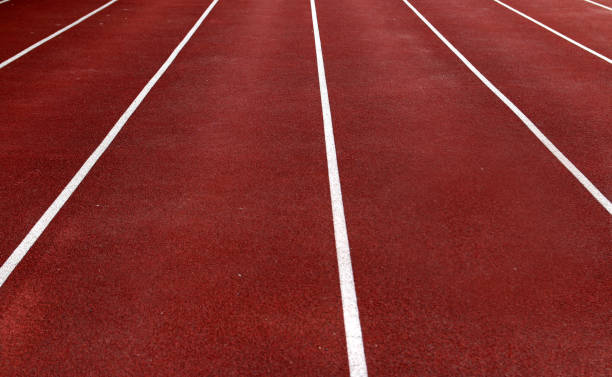 istock White lines on a racetrack 967985450