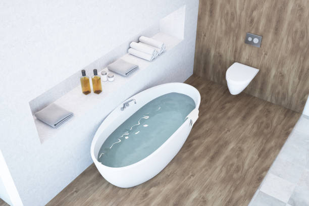 istock White and wooden bathroom design top view 967988688