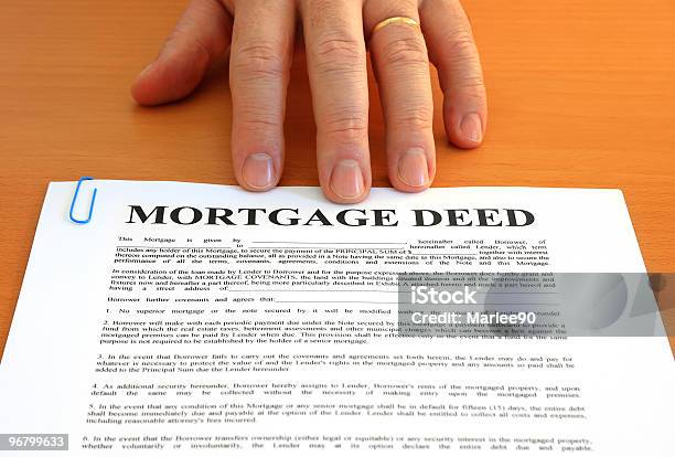 Mortgage Deed And Hand Stock Photo - Download Image Now - Agreement, Applying, Bank - Financial Building