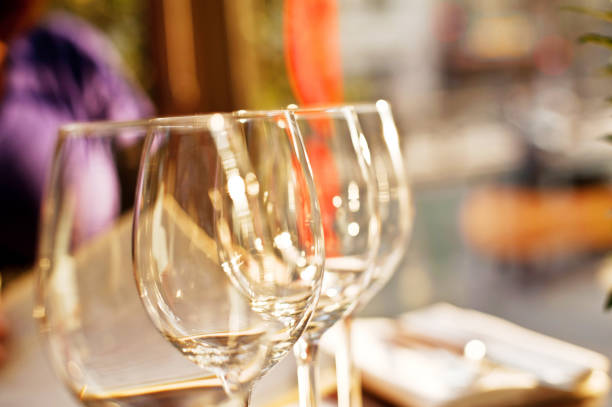 Dinner Table With Wine Glasses In Parisian Restaurant