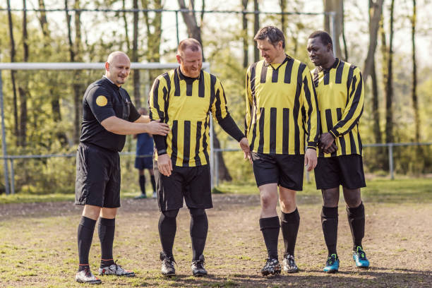 istock A soccer referee controlling the situation during a football match 968008990