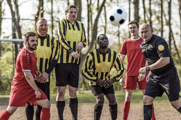 istock A soccer referee controlling the situation during a football match 968009062