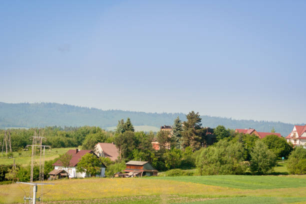 istock Houses among trees and shrubs located on the hill 968009618