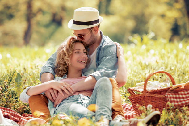 istock Couple on picnic in nature 968014482