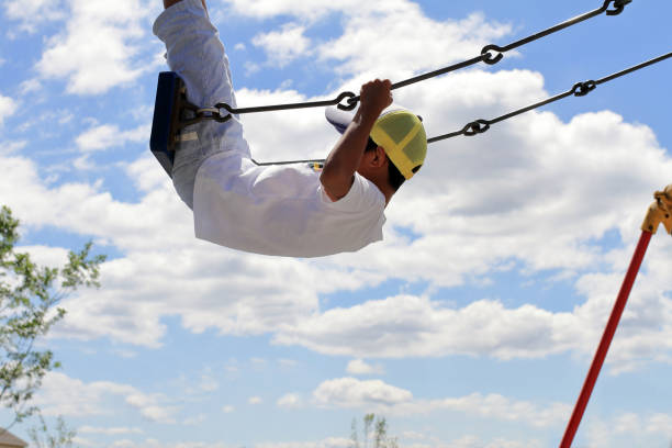 Japanese boy on the swing (third grade at elementary school)