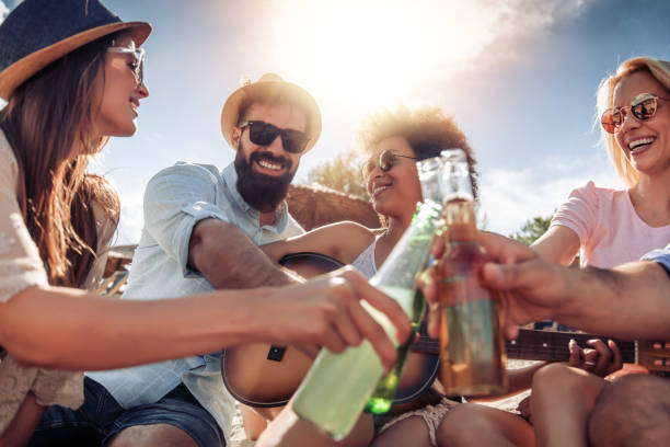 istock Group of friends having fun on the beach 968059726