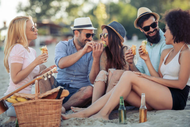 istock Group of friends having fun on the beach 968062338