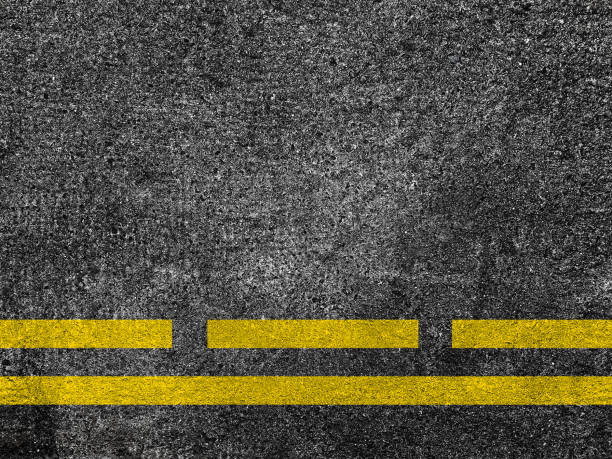 istock Asphalt road with dividing yellow lines. 968062510