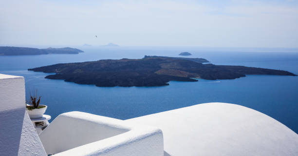 istock Santorini island, Greece - White roofs and caldera view 968065150