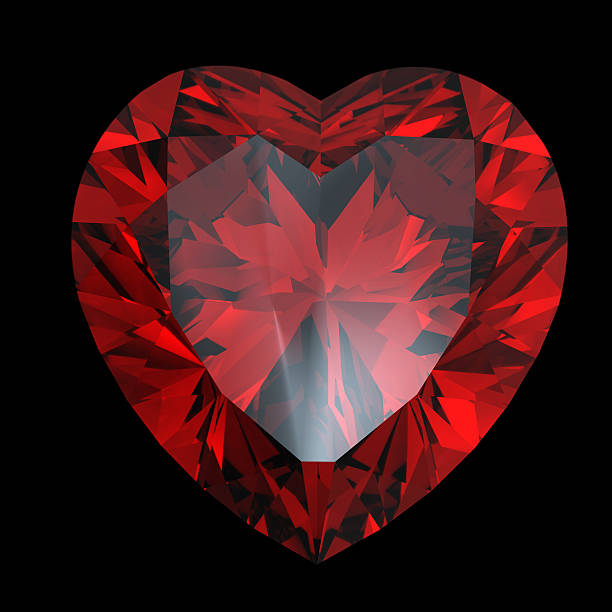Red heart shaped garnet stock photo