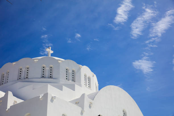 Santorini, Greece - White church on blue sky background