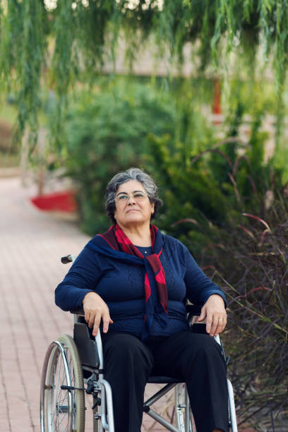 istock Senior woman in wheelchair 968072940
