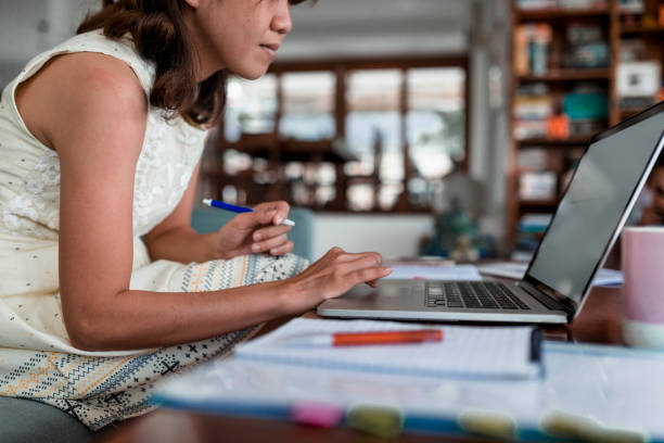 istock Chinese mother working from home 968075422