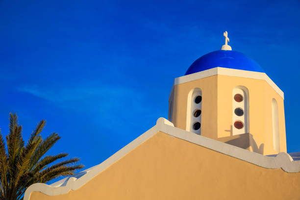 Santorini, Greece - Church with blue dome on blue sky background