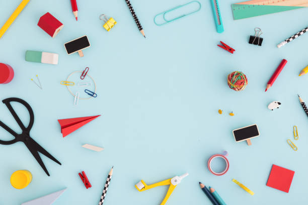 istock Mixed of school on blue table. Flat lay with copy space. 968083546