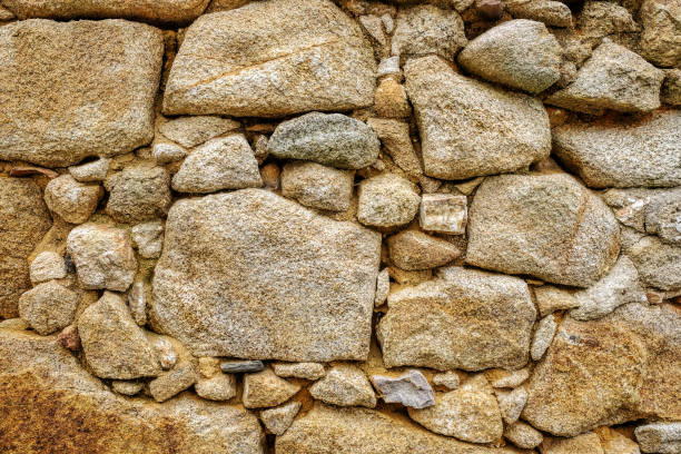 background wall with exposed stone stock photo