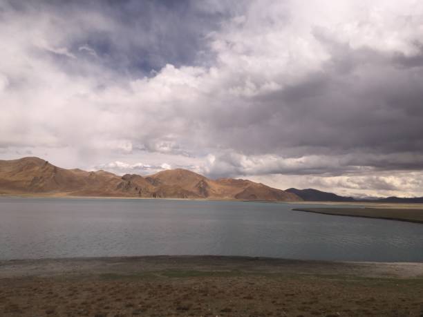 istock Lake Yamdrok on Cloudy Spring Day in Tibet, China. 968137540